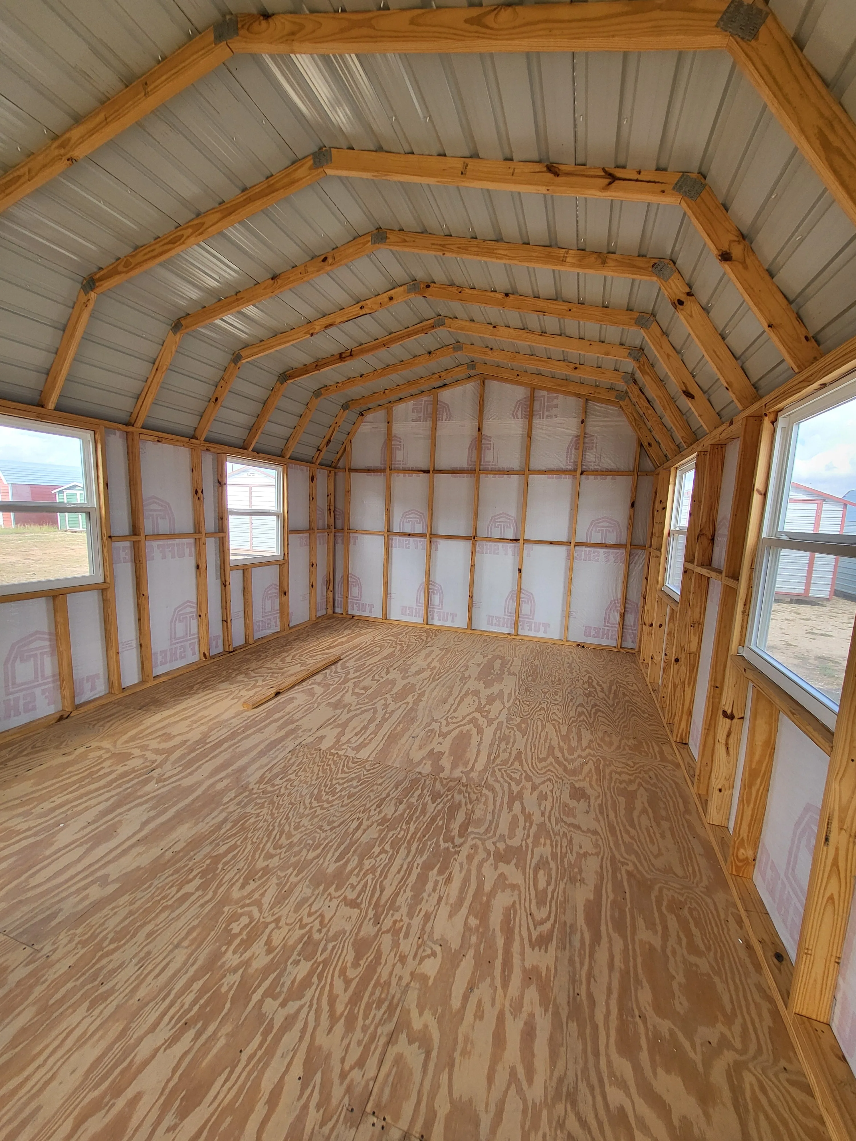 06 x 06 Steel Storage Shed in Tan Siding and Green Trim